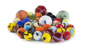 a cluster of marbles of varying sizes and colors